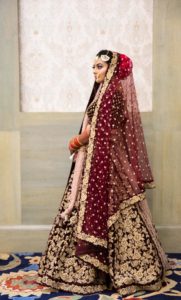 Bride looking stunning in a wedding lehenga