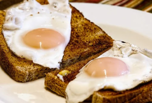 Dad loves his butter toast and eggs with sunny side up